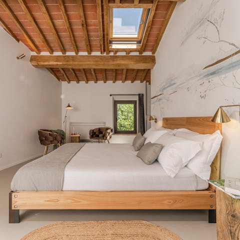 Drift off to sleep under the traditional beamed ceilings