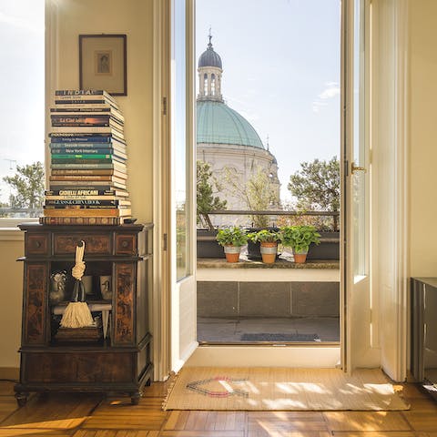Enjoy the beautiful view of basilicas and beyond from your light-filled living space