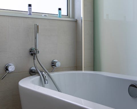 Soak weary muscles in the tub after a day in the city