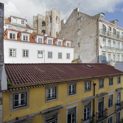 Admire the view of the Sé Cathedral from the window