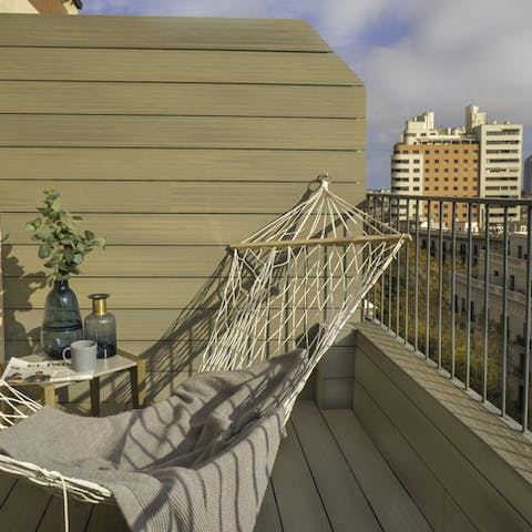Relax on the hammock with a view of the city