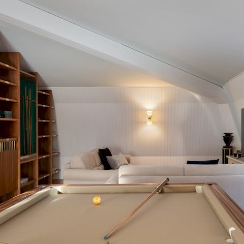 Enjoy a games night with loved ones in the upper floor sitting room