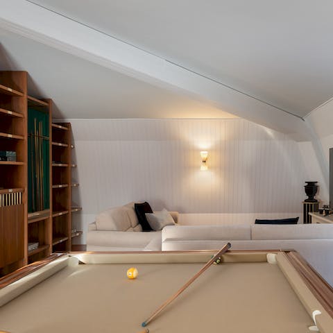 Enjoy a games night with loved ones in the upper floor sitting room