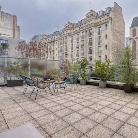 Drink French wine on the private terrace after a day of exploring the city of lights