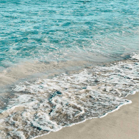 Splash in the shallows of Agua Blanca beach – it's a fifteen-minute drive