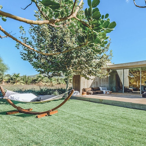 Doze in a hammock and feel the Ibizan sun warm your skin