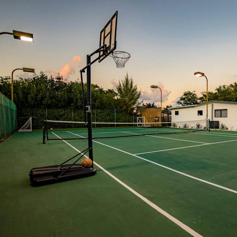 Serve, shoot, or score on the private sports courts