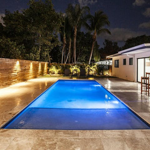Swim in the private outdoor pool