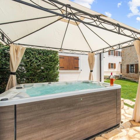 Toast the day with evening drinks in the hot tub