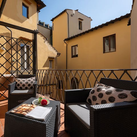 Enjoy drinks on your private balcony each evening