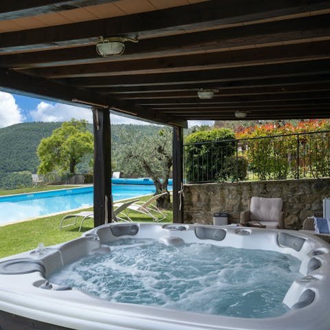 Watch the sunset from the bubbles of the hot tub