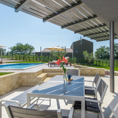 Gather on the sunny terrace for a barbecue