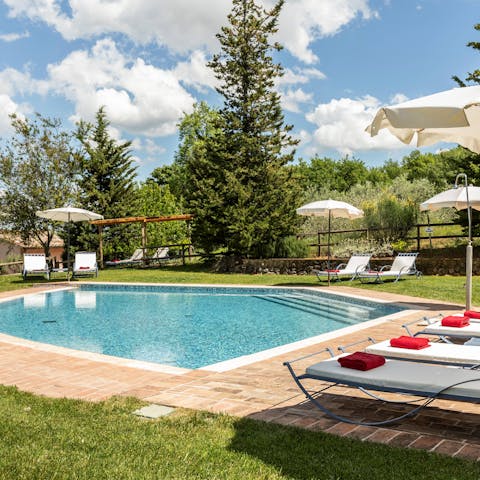 Relax by the private pool, surrounded by picturesque Tuscan countryside