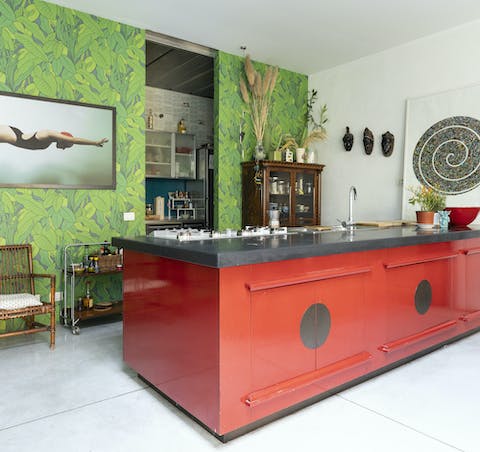 The bright red kitchen island