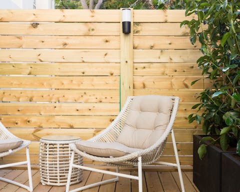 A patio with lounge furniture