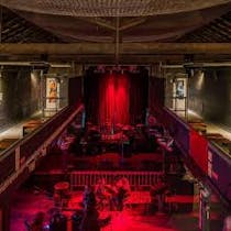 Have a beer and watch a local band concert at Templários Bar