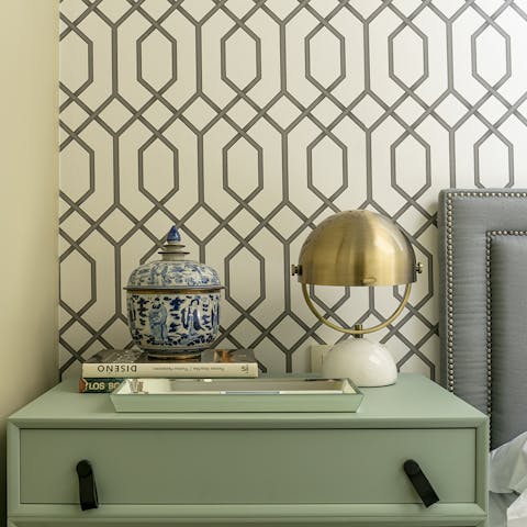 The art-deco-inspired wallpaper