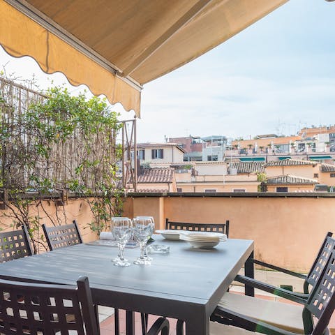 Enjoy a glass of vino from your sheltered terrace