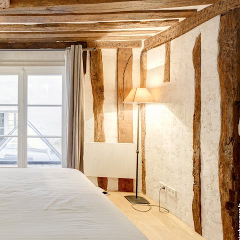 Get a restful night's sleep in the cosy bedrooms with rustic exposed beams