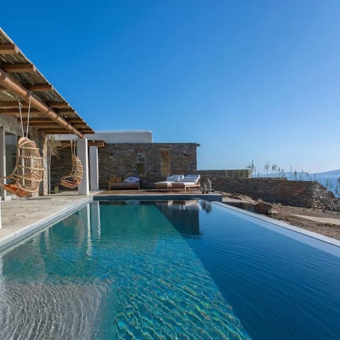 Spend rejuvenating days relaxing by the pool and gazing across the horizon