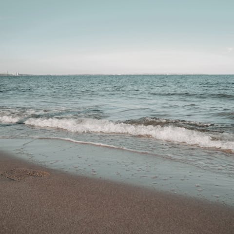 Explore the coast, starting with a beach day at Kamini, minutes away