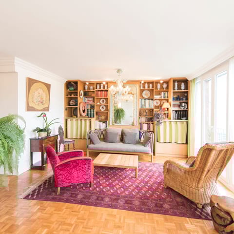 Enjoy the ecclectic array of trinkets and books in the living room