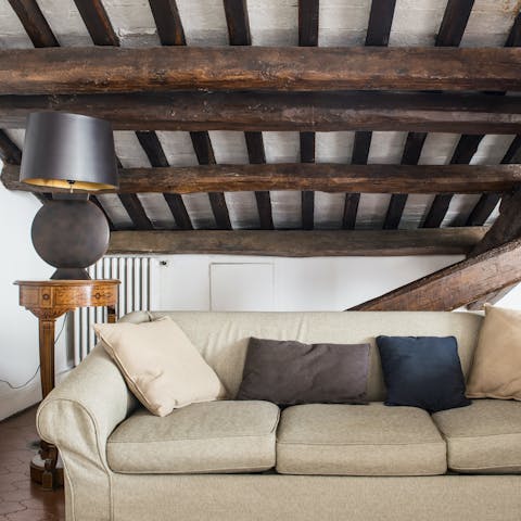 The exposed wooden ceiling
