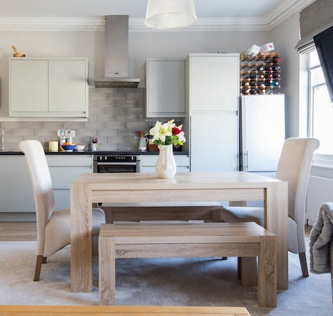 A smart dining table with bench seats
