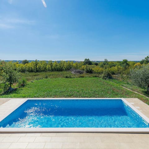 Savour peace and relaxation while lounging by the pool