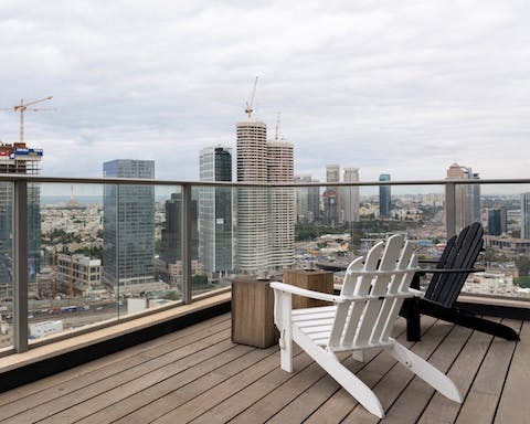 Take in the sweeping views of Tel Aviv and relax with a glass of bubbly