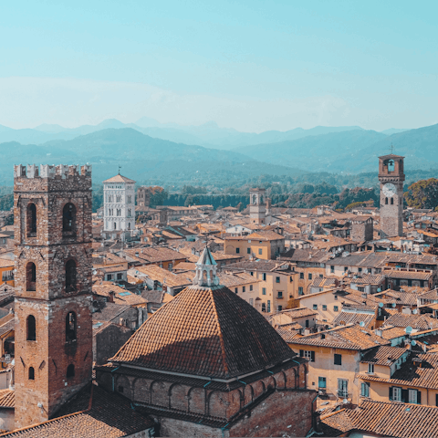 Spend an afternoon exploring the ancient city of Lucca, a thirty-five-minute drive from your home