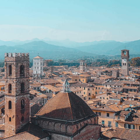 Spend an afternoon exploring the ancient city of Lucca, a thirty-five-minute drive from your home