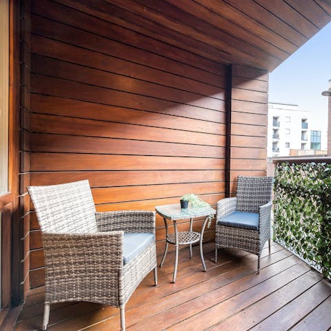 Enjoy a cup of coffee on the small balcony