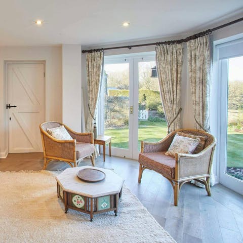 Relax in the conservatory, with a view of the garden