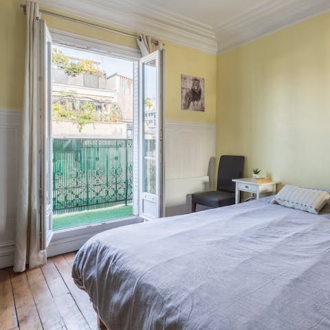 Large windows with views of Paris