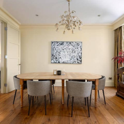 Enjoy a leisurely meal at the dining table before heading to a local pub