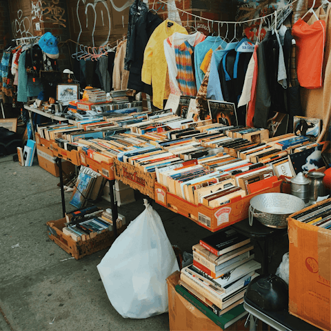 Shop for vintage goods at market stalls on Brick Lane
