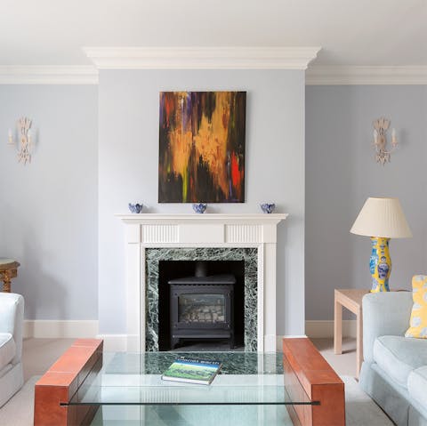 Cosy up by the fireplace on chilly evenings