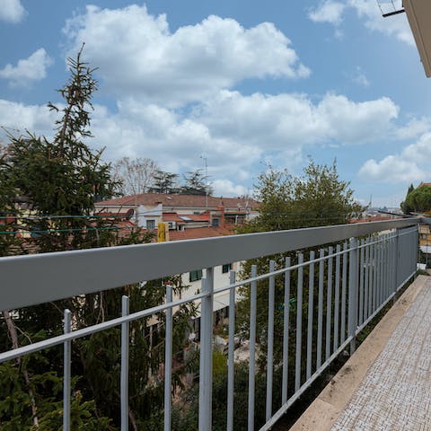 Enjoy your morning espresso on the private balcony