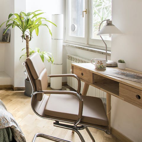 Get on top of some work or study remotely at the desk in the bedroom