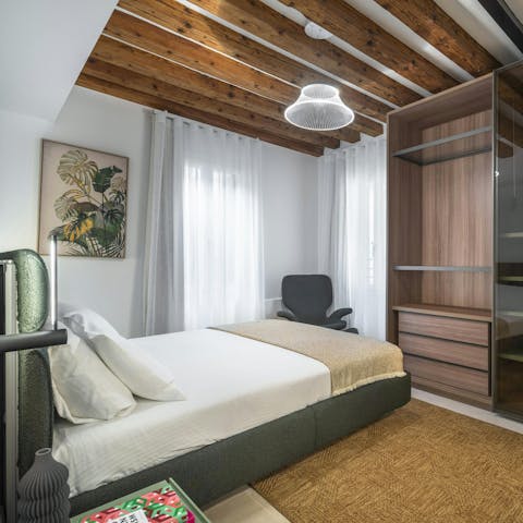 Wake up beneath wooden beams feeling rested