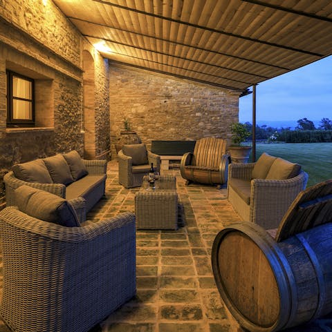 Sip a glass of sauvignon blanc on the terrace as the sun goes down