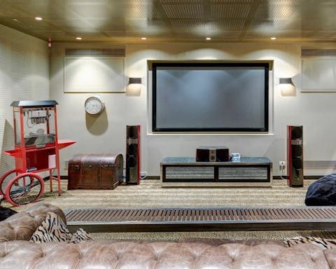 Gather the family in the plush cinema room