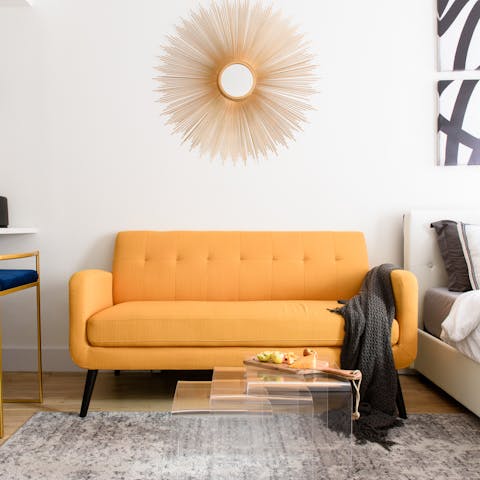 Unwind on the statement yellow sofa