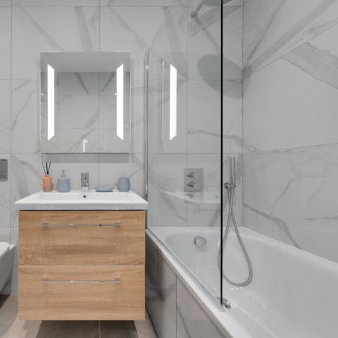 Sink into a hot bath to unwind after a busy day out