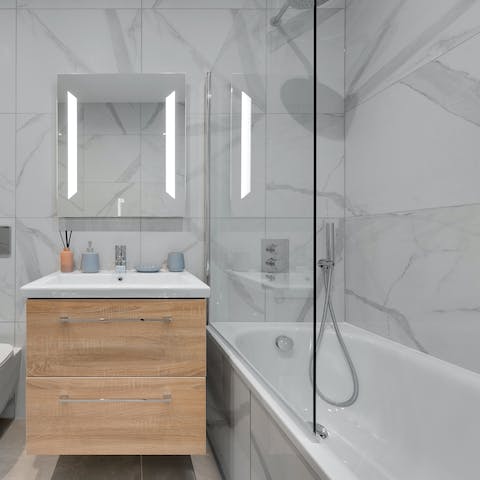 Sink into a hot bath to unwind after a busy day out