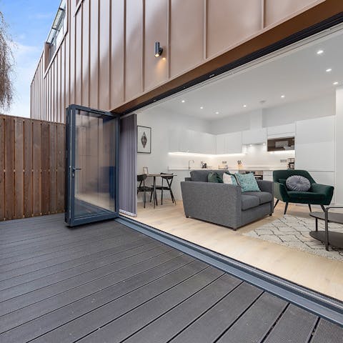 Step out onto the spacious patio for drinks in the fresh air