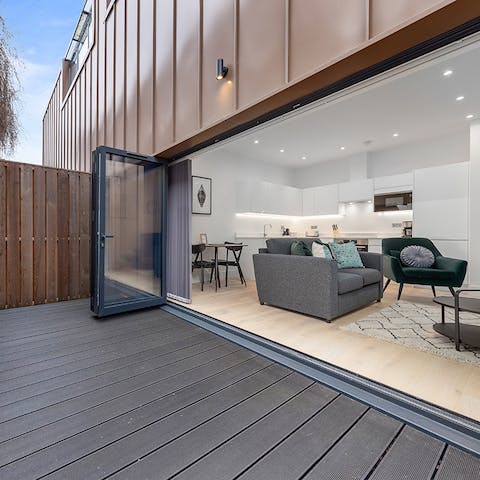 Step out onto the spacious patio for drinks in the fresh air