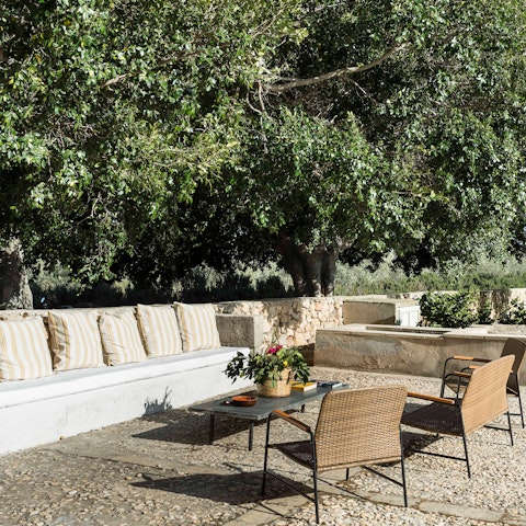 Open a bottle of wine and enjoy it in the sun-drenched gardens