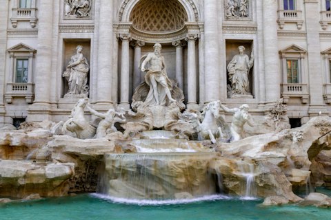 Toss a coin into the Trevi Fountain, Rome's breathtaking baroque masterpiece, an eighteen-minute walk